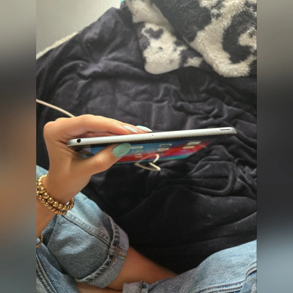 Apple iPad 5th Genetaction with Silver and Black Frame